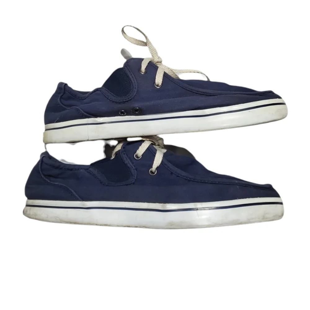 Men's blue and white Lugz sneakers.
